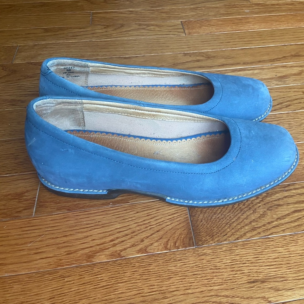 Blue women’s rounded toe shoe with treaded sole